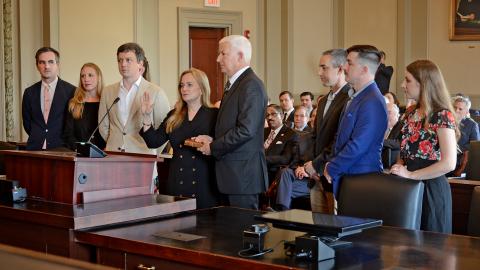 Judge Flood takes the oath of office during a ceremony at the North Carolina Court of Appeals. 
