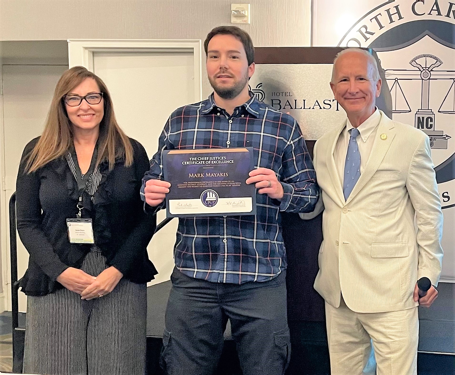Mark Mayakis (center) receives the Chief Justice's Certificate of Excellence Award