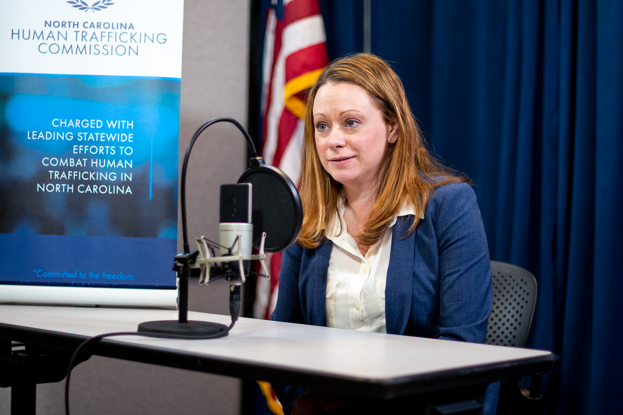 Christine Long conducting a podcast interview