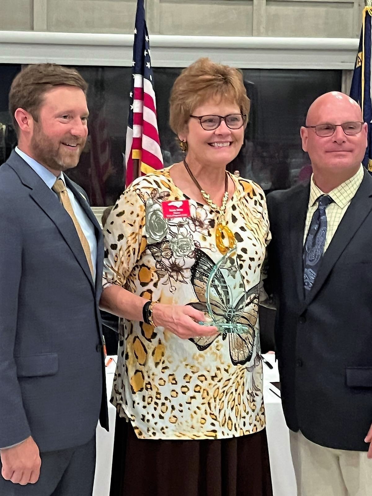 Clerk Susan Hicks (center) poses with NCAOC Director Judge Andrew Heath (left) and outgoing president Ray Matusko (Currituck County) (right). 