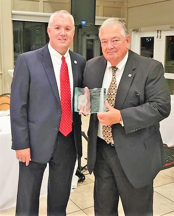 The Honorable Todd Tilley (Perquimans) (right) poses with the recipient of the Rachel Joyner Award former clerk of court and current Commissioner Nathan “Tommy” Everett. 