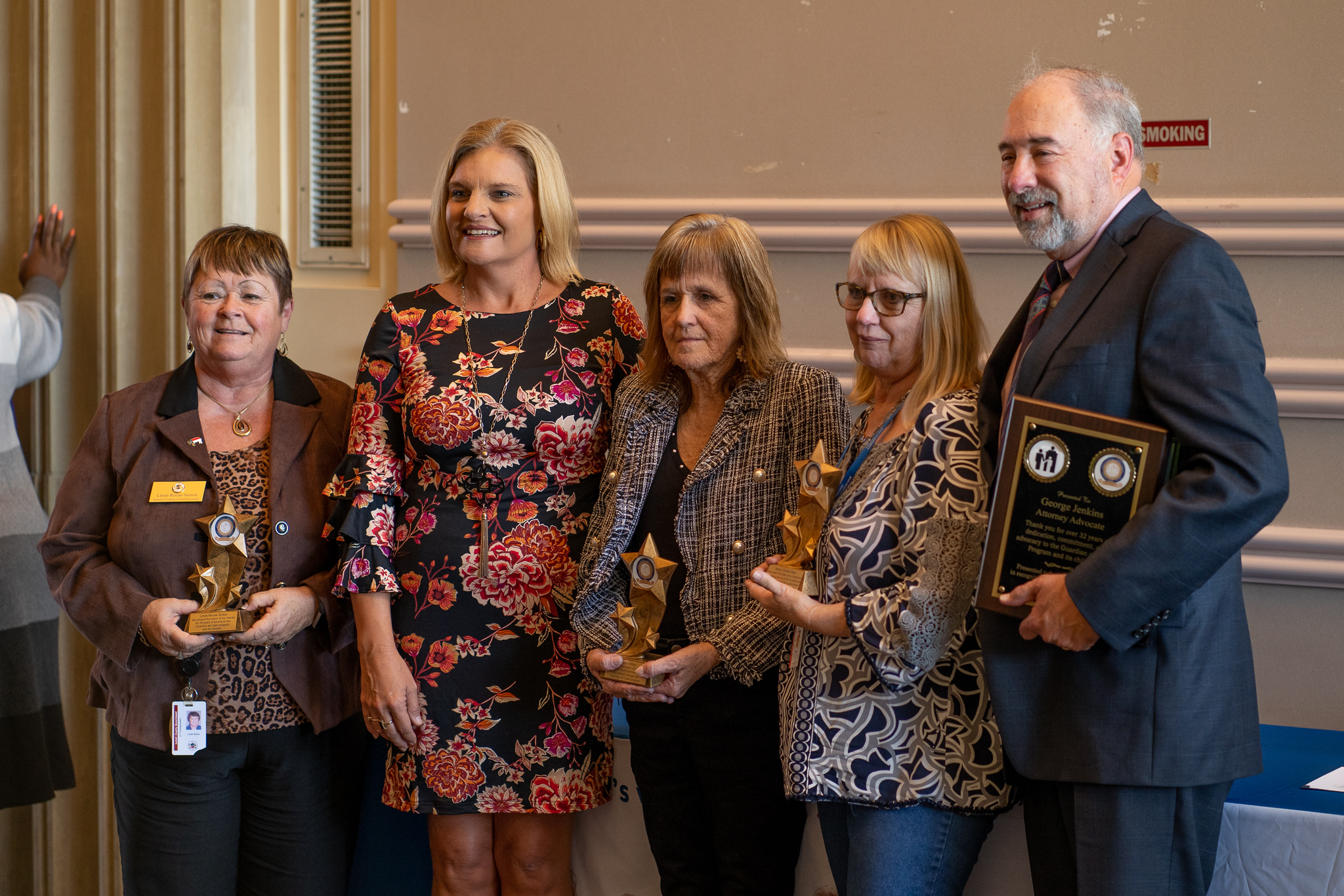 Awards recipients pose with their awards