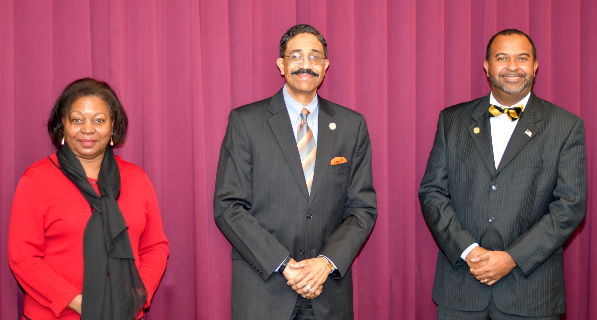 Associate Justice Michael Morgan (center) standing with Judge Wanda Bryant and Judge Fred Gore