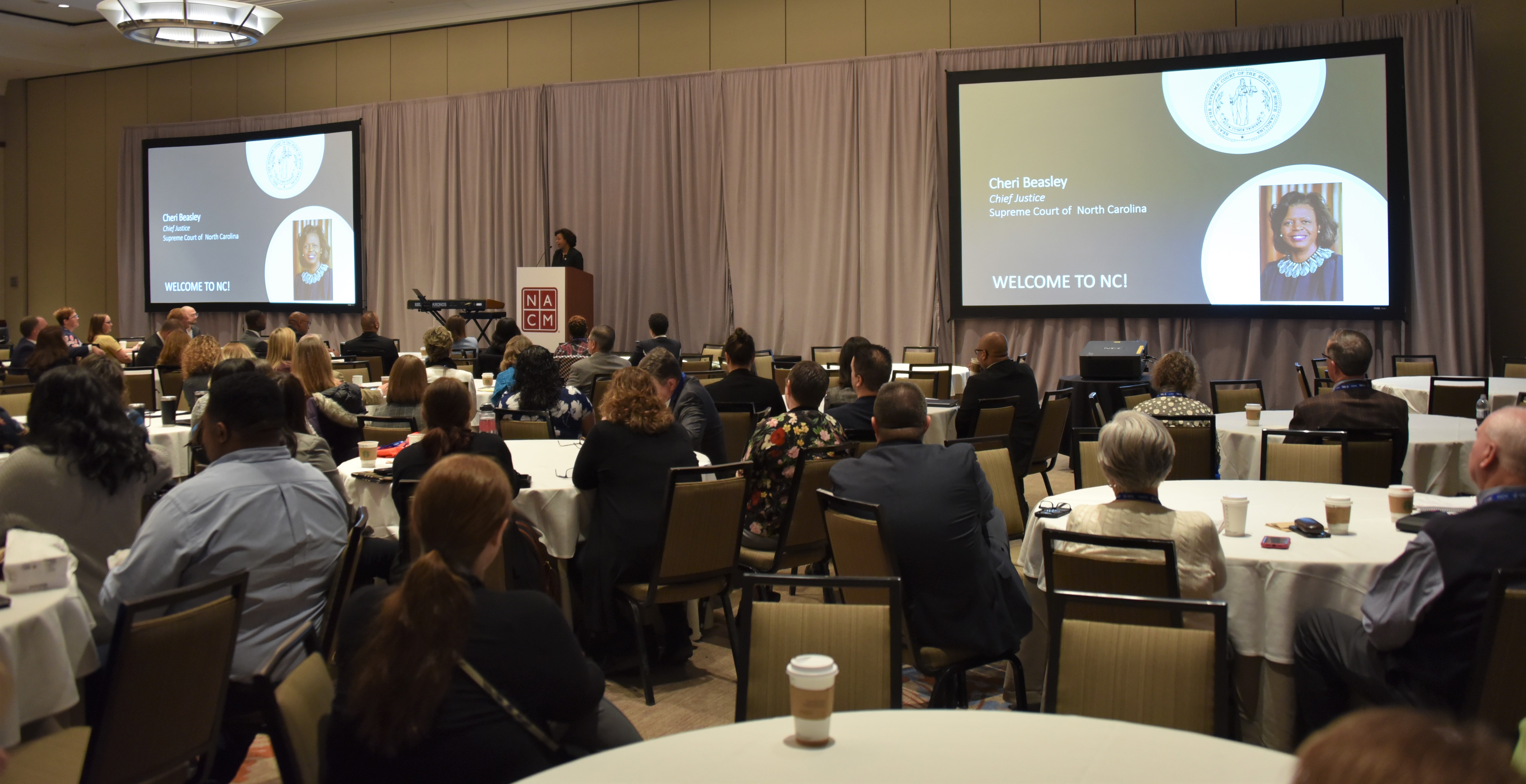 Chief Justice Beasely makes opening remarks to NACM members. 