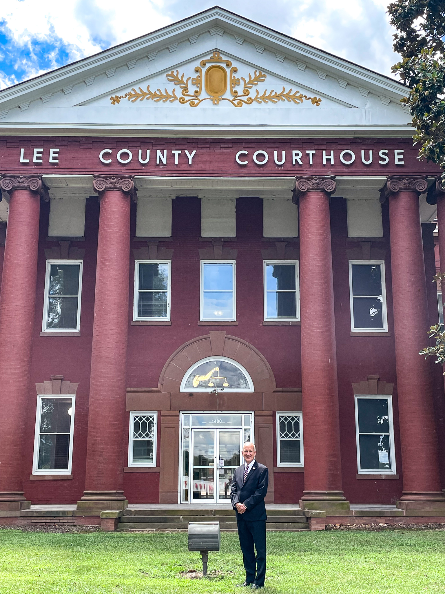 Chief Justice Paul Newby in front of the Lee County Courthouse