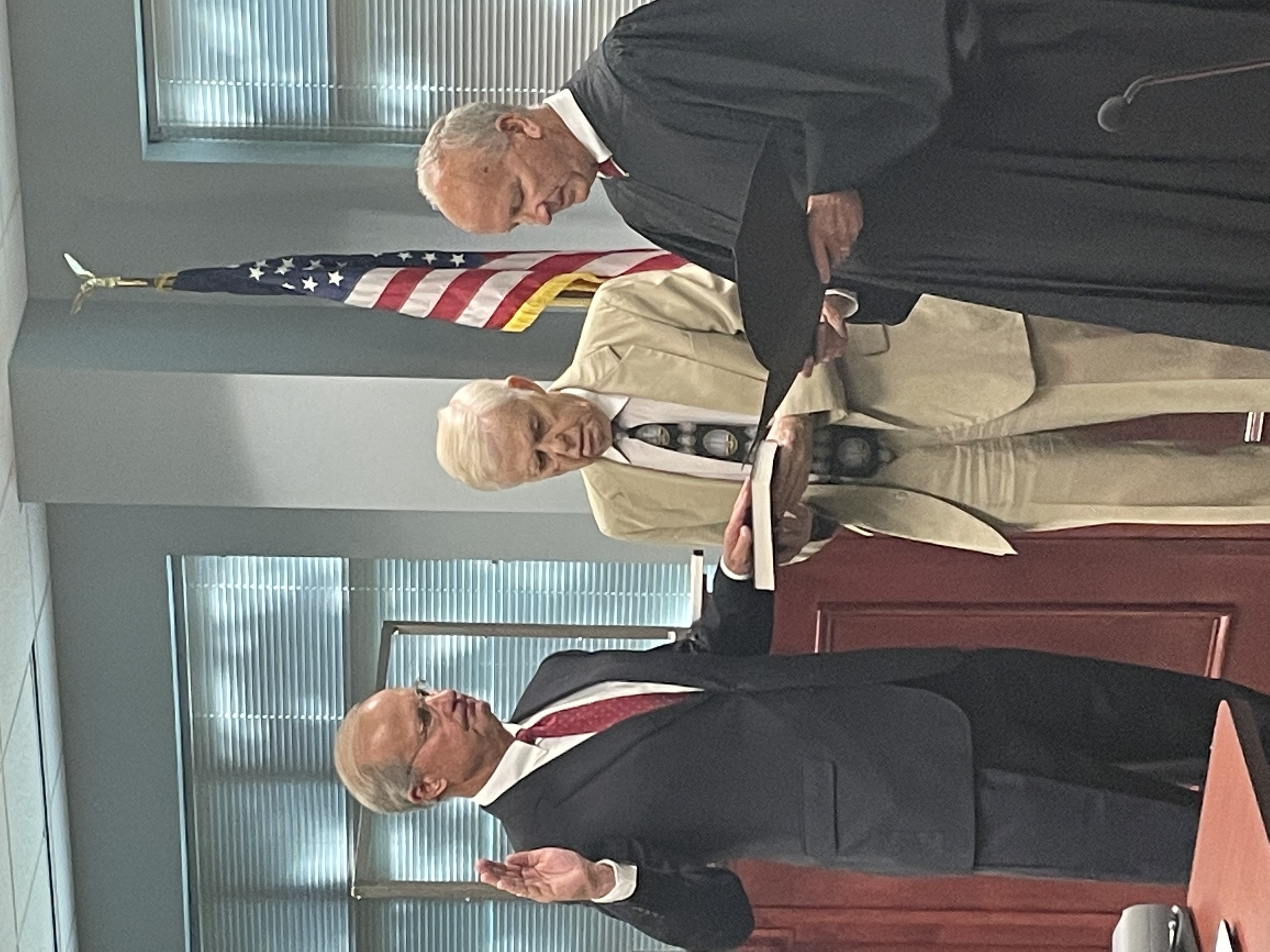 Chief Justice Newby administers the oath of office to Dr. Donald van der Vaart