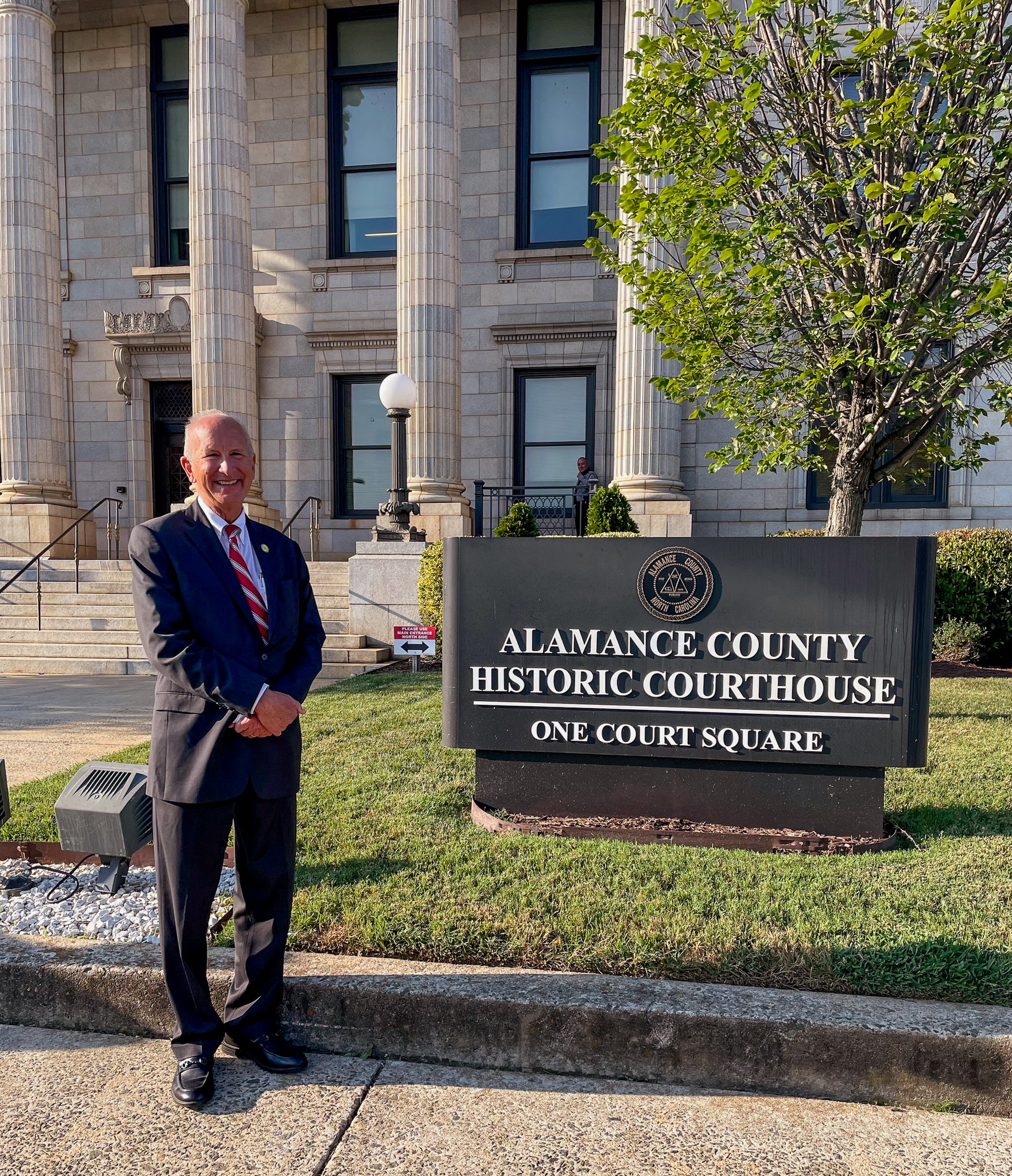 Chief Justice Newby in front of the Alamance County Courthouse in Graham