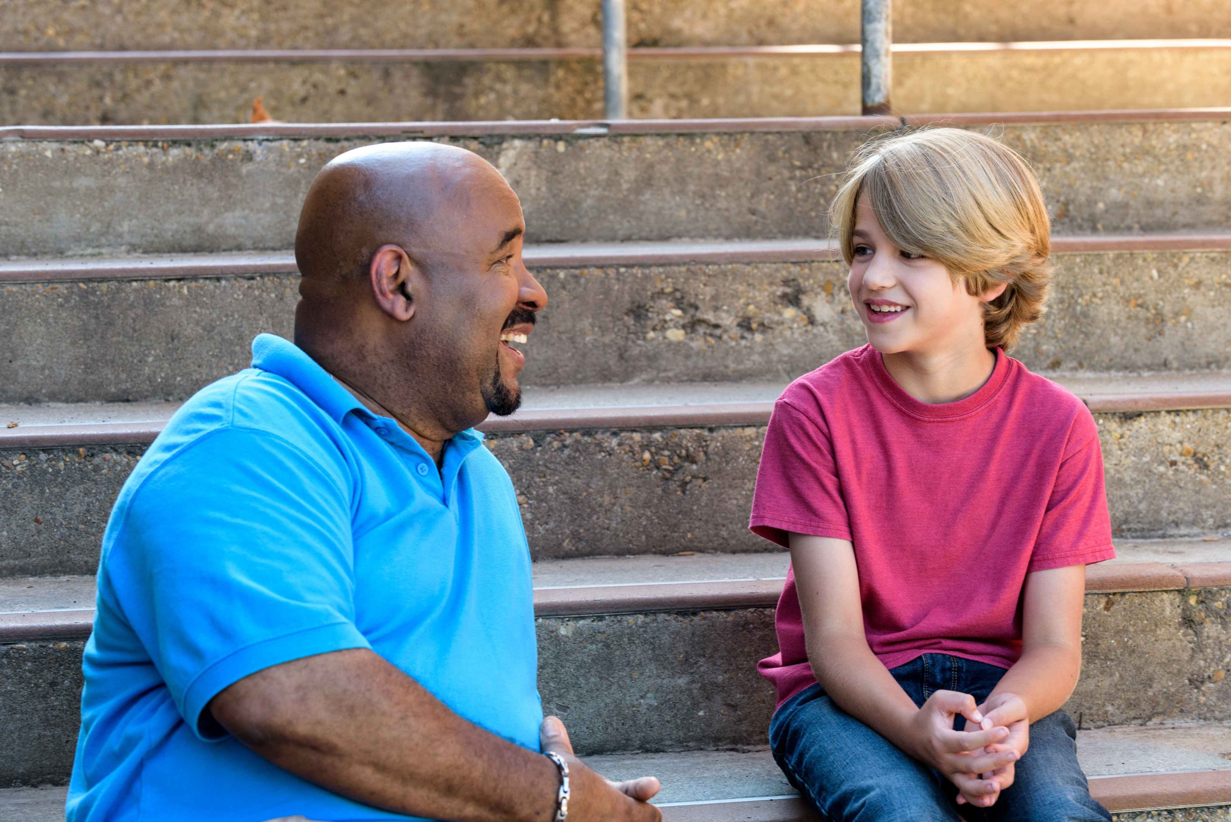 Advocate and child on stairs