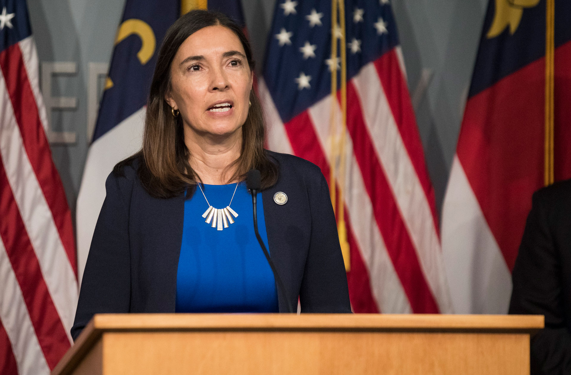 Justice Anita Earls speaking during the press conference. Photo credit: The News & Observer