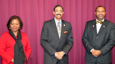 Associate Justice Michael Morgan (center) standing with Judge Wanda Bryant and Judge Fred Gore
