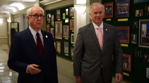 Former Chief Judge Gerald Arnold (left) and Mel Wright walk the halls of the North Carolina Court of Appeals.