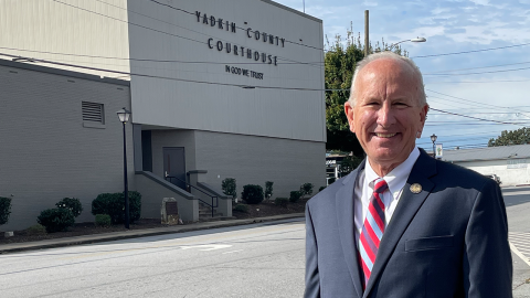 Chief Justice Paul Newby outside of the Yadkin County courthouse.