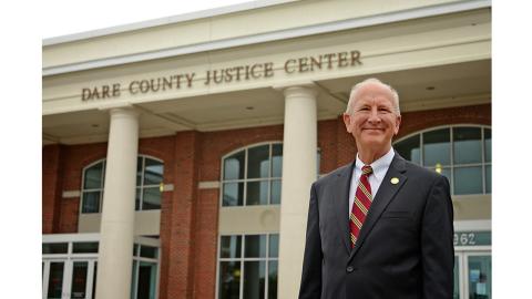 Chief Justice Paul Newby completed his historic 100-county courthouse tour in Dare County. 