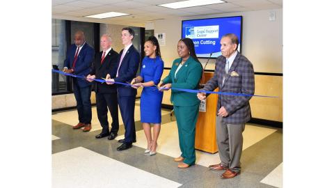 From left to right, Wake County Manager David Ellis, Chief Justice Paul Newby, Wake County Commissioner Matt Calabria, Judge Ashleigh Parker Dunston,  Wake County Commission Chair Chair Shinica Thomas, and Commissioner Dr. James West prepared to cut the ribbon. 