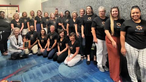 Chief District Court Judge Beth Heath (holding award) poses with the Family Accountability and Recovery Court team. Chief District Court Judge Beth Heath (holding award) poses with the Family Accountability and Recovery Court team.