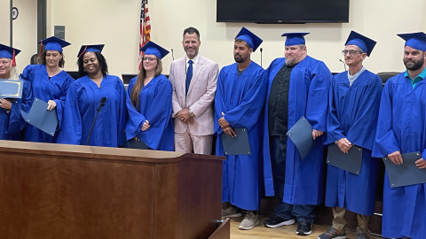 Senior Resident Superior Court Judge Jason Disbrow (center) with July 27 Recovery Court Graduates. Senior Resident Superior Court Judge Jason Disbrow (center) with July 27 Recovery Court Graduates.