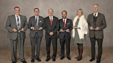 Pictured left to right: Darrin D. Jordan, Hon. Michael L. Robinson, Chief Justice Paul Newby, Robert E. Harrington, Allison Mullins, and James “Jimbo” Perry.